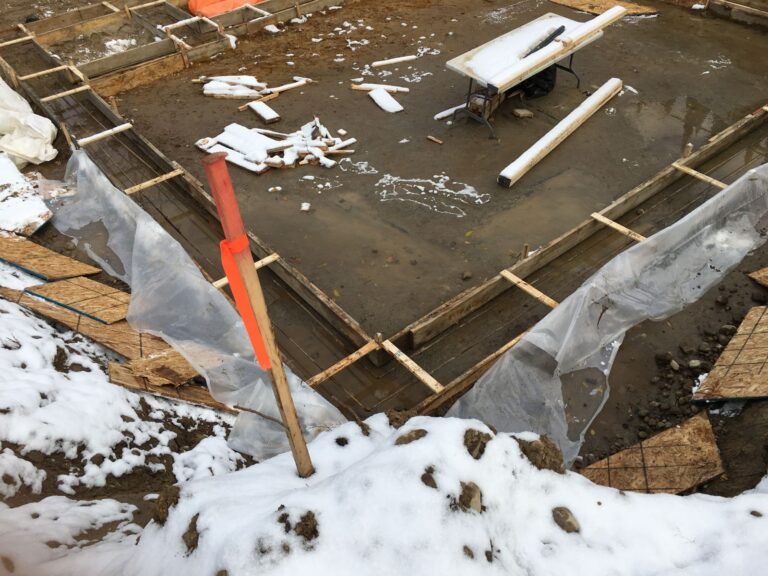 Footings formed and poured in late fall on a waterfront lot