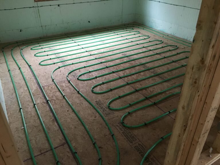 Radiant in-floor heat tubing laid inside ICF walls