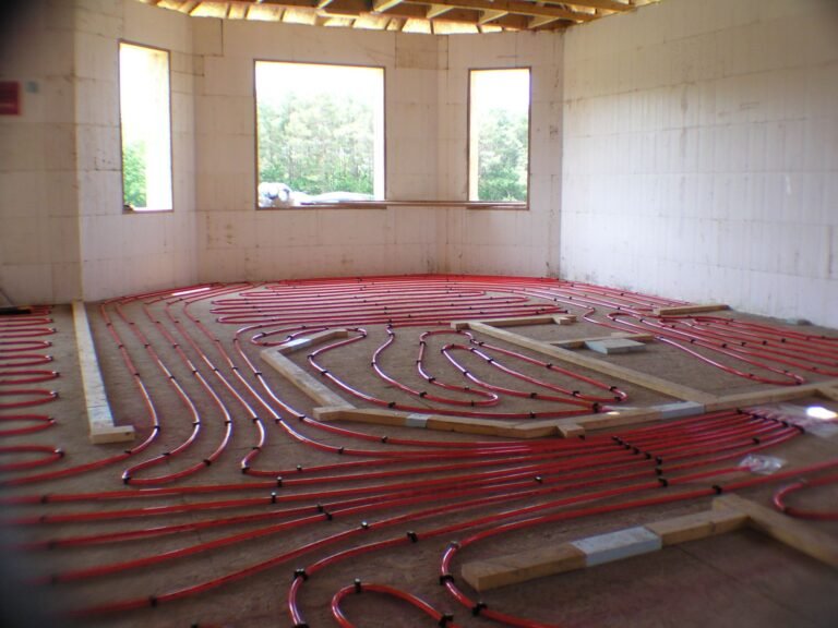 Radiant in-floor heating tubes laid inside ICF walls in Meaford