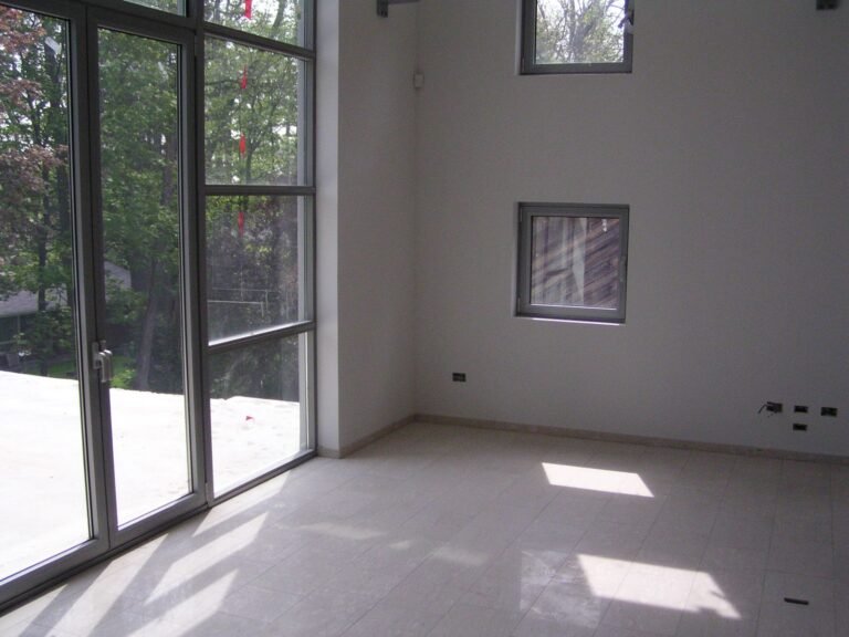 Open interior with floor-to-ceiling windows