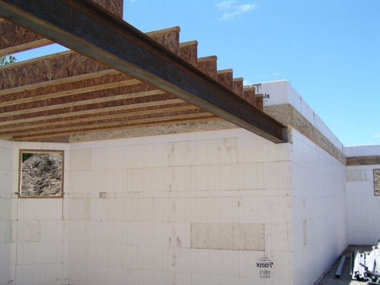 Steel beam and joists on ICF walls of a cottage