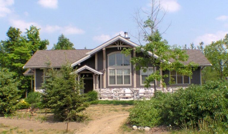 Finished cottage with stone and timber over ICF walls