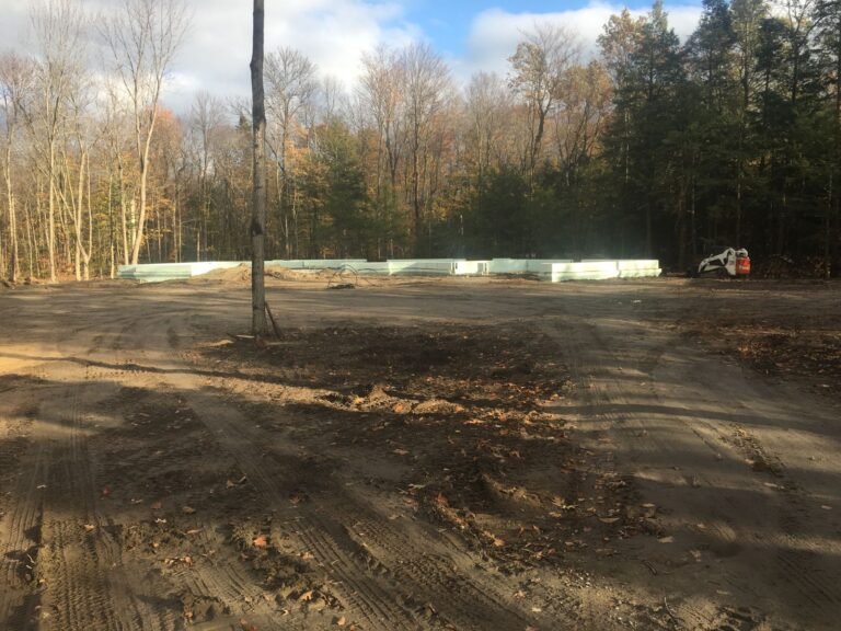 ICF foundation walls on a cleared wooded lot