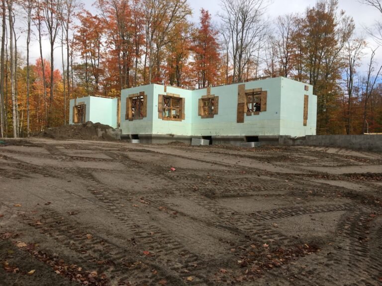 ICF walls standing in the woods in the fall