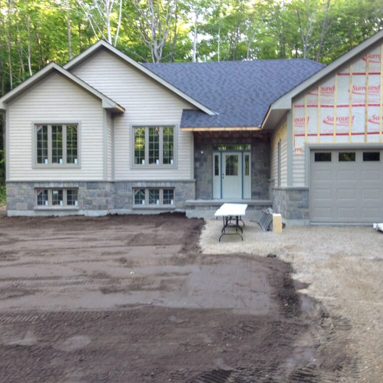 Finished stone-skirt bungalow in Tiny Township