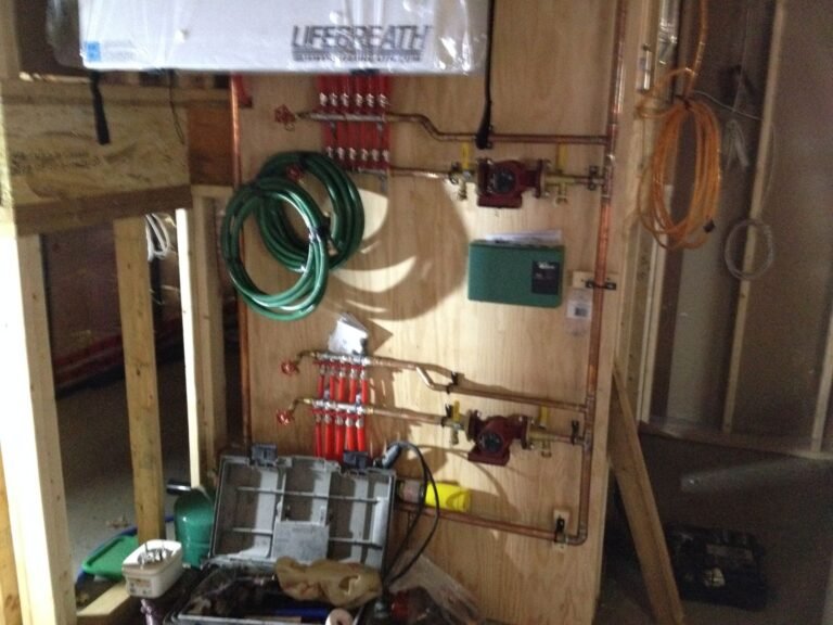 Mechanical room with wall-hung boiler and radiant manifold