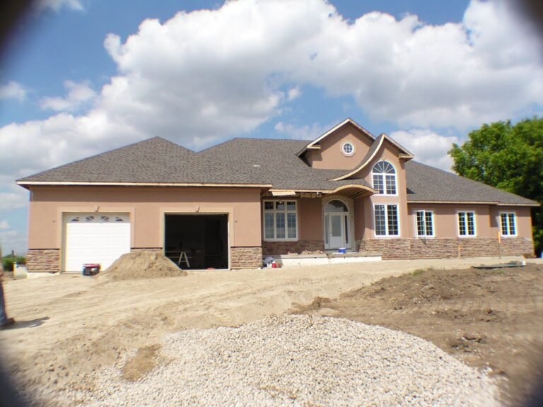 Finished front of an ICF walkout bungalow