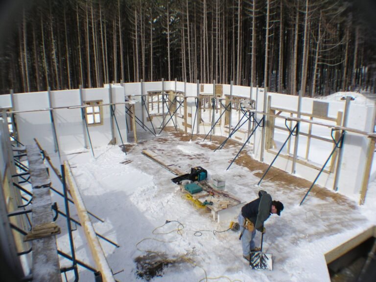 Crew bracing ICF walls in winter
